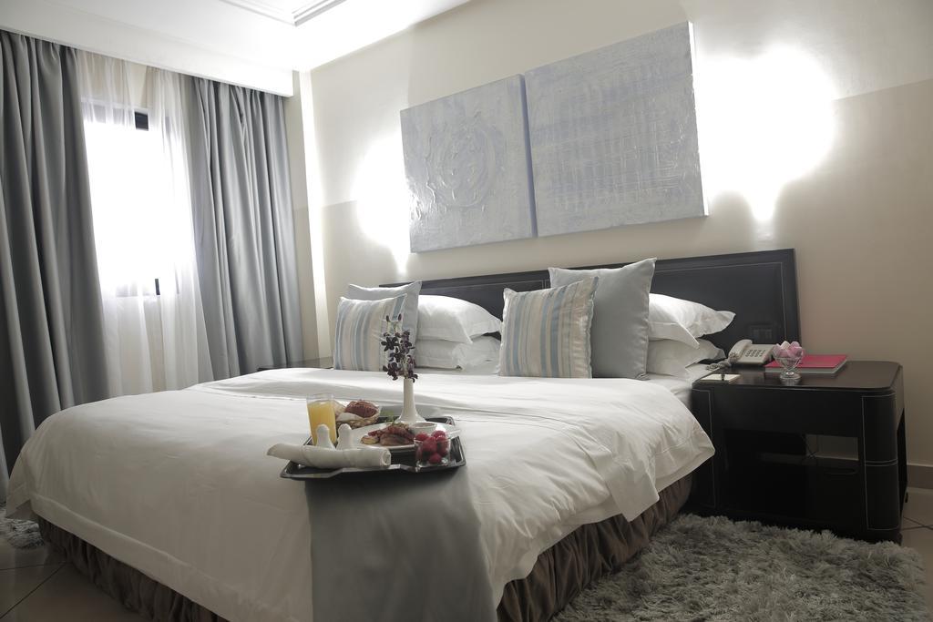 Oak Plaza Hotels East Airport Accra Chambre photo